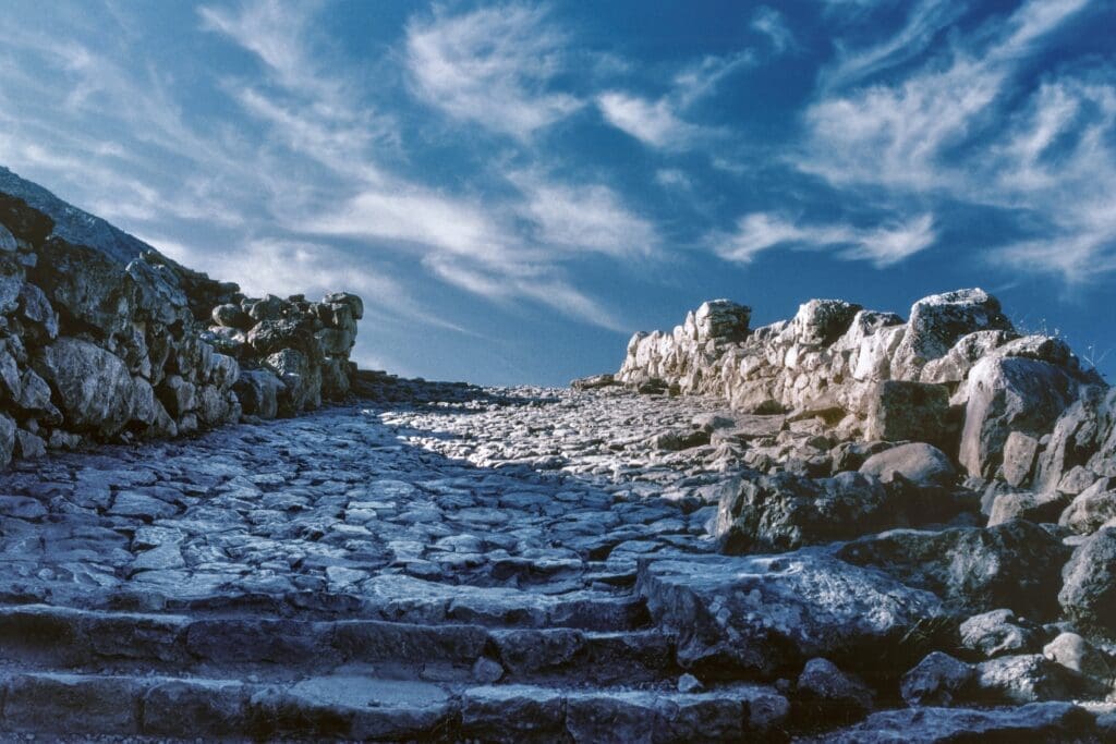 The ultimate Greek landmar off the beaten path, the Mycenean site of Mycenae and the main stone road once inside the Lion Gates