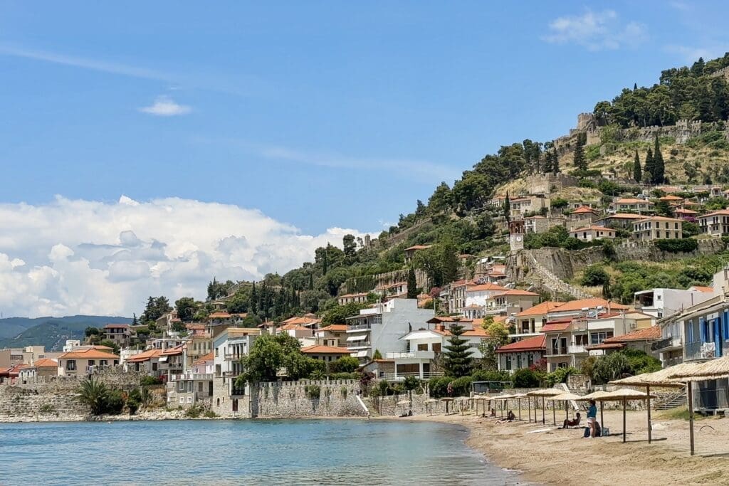 View of the castled city of Nafpaktos and one of the beaches outside the walls